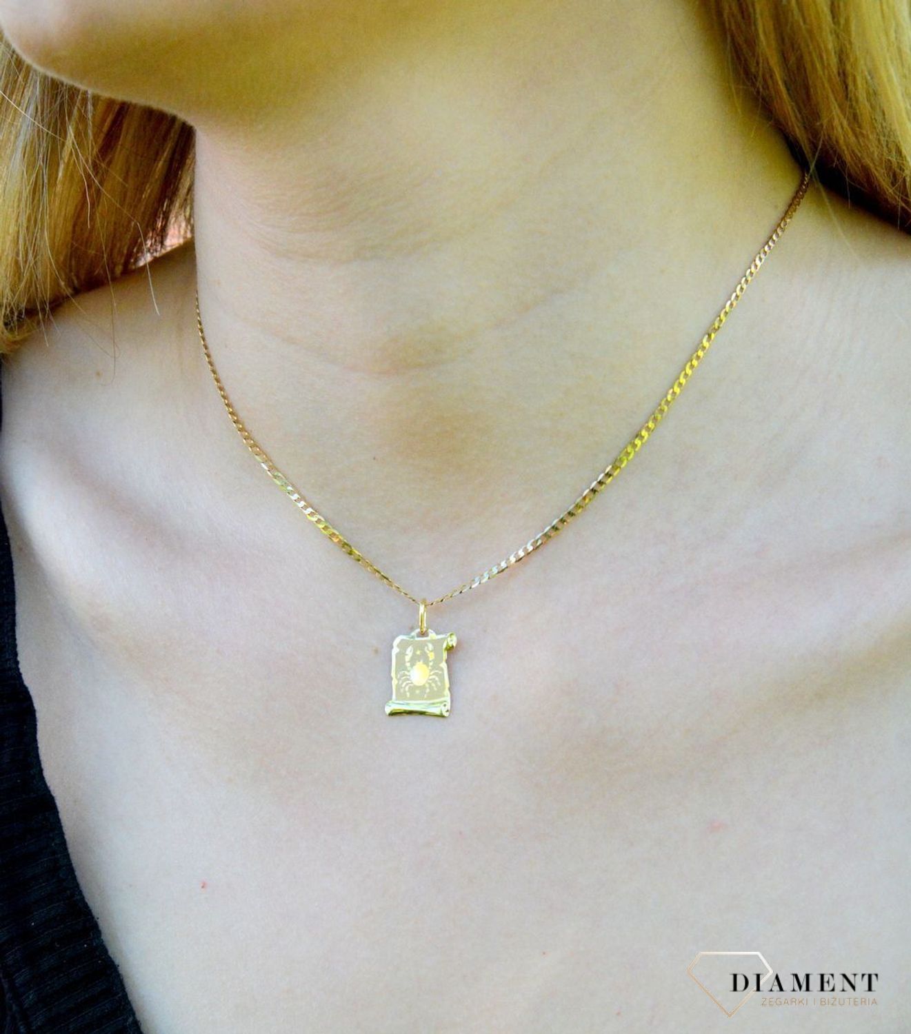 Złota zawieszka 585 znak zodiaku Rak ZA 3054I.  Zawieszka została wykonana ze złota próby 585.Zawieszka będzie pięknym prezentem dla bliskiej osoby spod znaku raka. W naszej ofercie dostępne są także naszyjniki i zawieszki z s.jpg